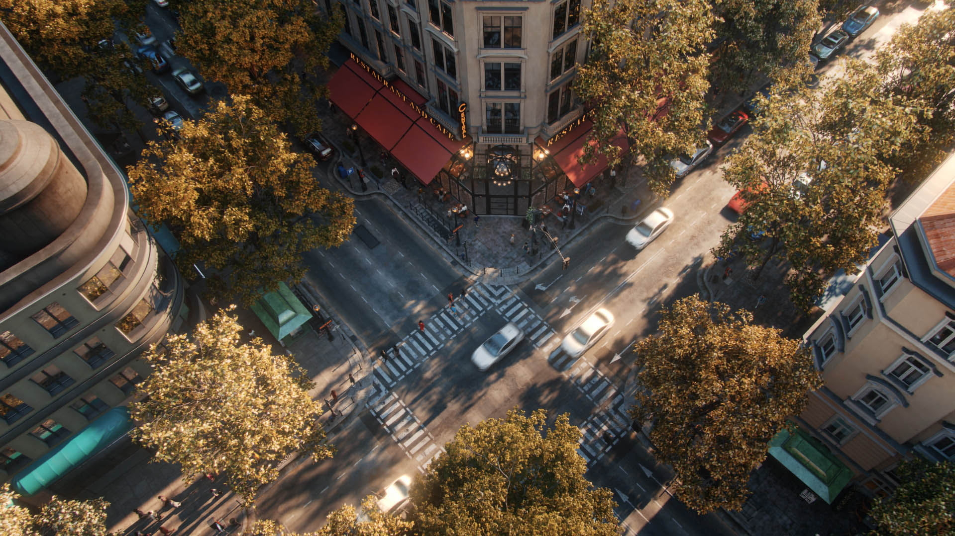 Envision rendering of an aerial view of a city intersection with cars, trees, and buildings in warm autumn light.