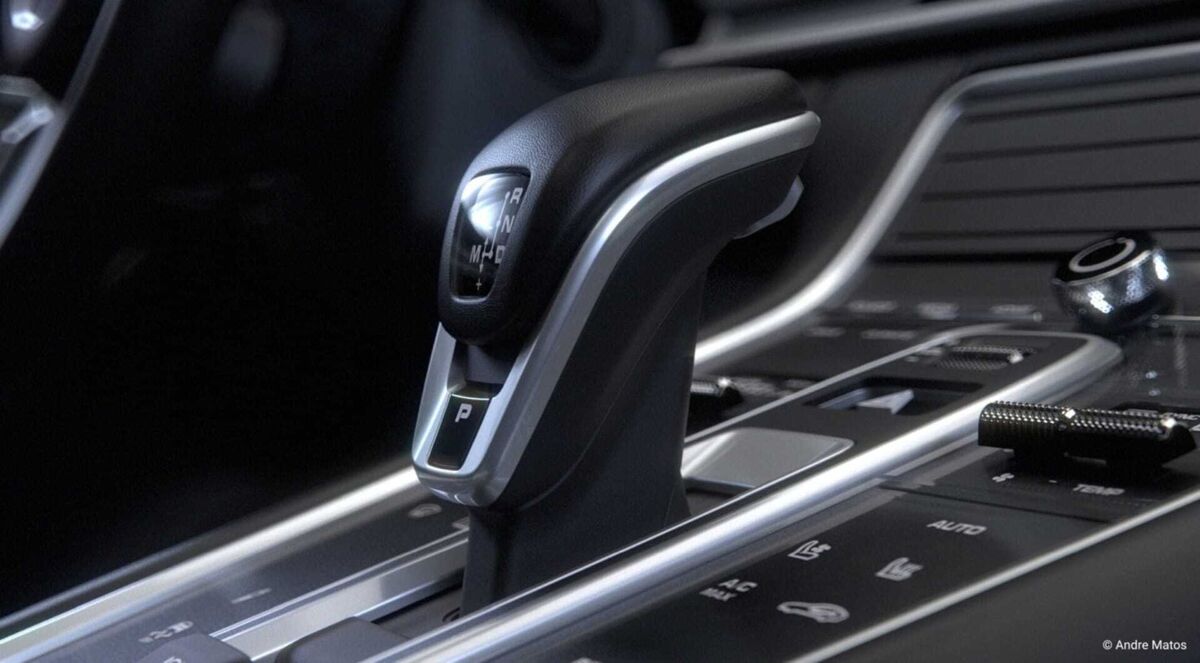 Close-up 3D render of a modern car’s automatic gear shift in the center console.