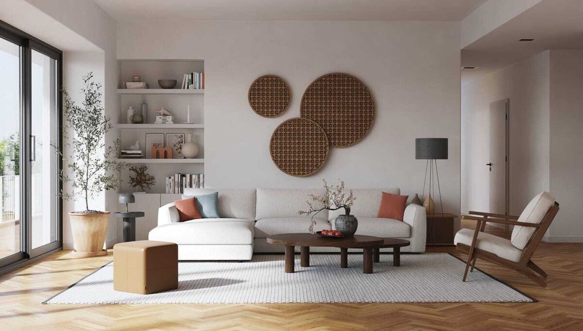 Rendering of a modern living room with neutral sofa, round wall art, and built-in shelving.